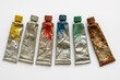 © The 2R Artificiality - Vintage paint tubes displayed on a plain white backdrop