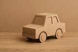 Cardboard model of a miniature toy vehicle Cardboard model of a miniature toy vehicle