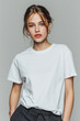 © Designer's Stockroom - A beautiful female model wearing a white t-shirt. A product shot for fashion and apparel. best use for mockup.