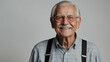 © Faraz-9461894 - A portrait of a happy senior man with glasses and a mustache, smiling broadly and looking directly at the camera.