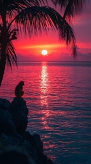 Wall Mural - tropical sunset over the ocean with palm tree silhouette