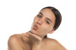 © vladimirfloyd - Studio shot of young woman blowing a kiss toward camera, natural look, glowing skin, white background.