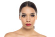 © vladimirfloyd - Portrait of young woman with glamorous makeup and red lipstick, looking confidently at camera, studio shot on white background.