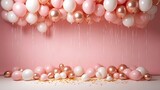 Pink and rose gold balloons scattered on floor with streamers white party