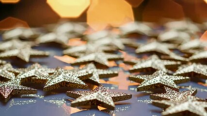 Wall Mural - Glittering gold stars reflecting light in a shimmering dance