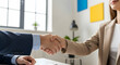 © MARNEN - Professional Handshake Securing A Mutually Beneficial Agreement In The Workplace
