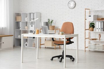 Wall Mural - interior of modern office with workplace and shelf units