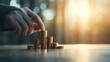 © Natthachai S. - Financial growth strategy business environment image of stacked coins nature background close-up view wealth concept