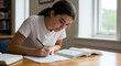 © brilliant - Focused teen studying