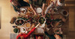 © peopleimages.com - Festive, meal and people in home, reunion and celebration of Christmas with food at night or dinner. Above, group and family with feast for thanksgiving, evening and together on holiday in house