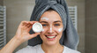 © Mei Studio - Happy Woman Applying Face Cream in Bathroom