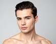 © Phanupong - Close up portrait of a young man with dark hair and brown eyes He has fair skin