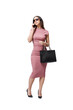© StockPhotoPro - Young stylish woman standing and having a phone call