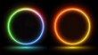 © Tunggal - Two glowing neon circles on a black background