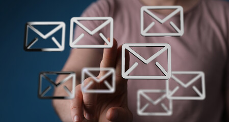 Person interacting with email icons, digital inbox, email management.