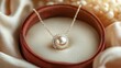 © MUCHAMAD - Delicate pearl necklace in a velvet box