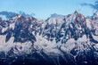 © Yuliia - Chamonix valley landscape of a prominent rocky towering mountain peak Aiguille du Midi in French Alps. Chamonix-Montblanc area, Tour du Montblanc beautiful landscape Aiguille du Midi summit, France