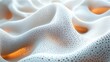 © naeem - Abstract wavy textile surface with small particles represents fabric technology breathable materials microscopic texture and innovation in material science with light orange glowing soft elements