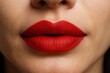 © Oleg - A striking red lipstick stands out against the skin, capturing attention with its vibrant hue