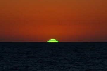 Wall Mural - a glowing island in a sea of orange hues