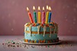 © siddikur - Festive birthday cake with colorful candles and drips of frosting