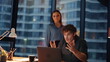 © stockbusters - Annoyed business people videocalling frustrated documents mistake at dark office