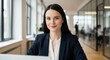 © Png stock 26 - Photo of brunette businesswoman smiles while working on a laptop in an office
