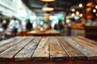 © LimeSky - Close up photo of an old wooden table in a cafe with a blurred background