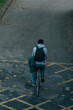 © carballo - top view of a young man riding a bicycle