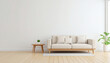 © Pastel - A minimalist living room featuring a light-colored sofa, a wooden side table, and a potted plant, creating a serene and inviting atmosphere