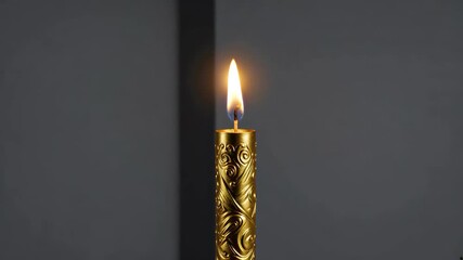 Wall Mural - there is a candle that is lit in the dark