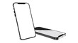 © Hamxa - Two smartphones with blank white screens one standing and one lying down on a white background scene view