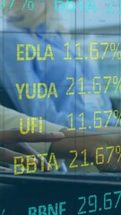 Wall Mural - animation of trading board and grid pattern over midsection of woman using laptop