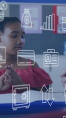 Wall Mural - animation of statistics and data processing over diverse schoolgirl and male teacher