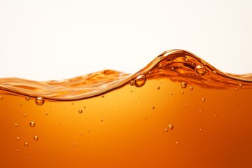 Wall Mural - close-up of orange liquid wave with bubbles on light background, showing fluid motion and creative s