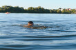 © Serhii - Man drowning in a lake during summer vacation