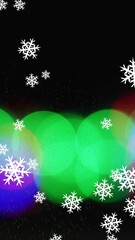 Wall Mural - animation of snow falling over light spots on black background