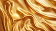 © Nur - Close-up view of golden fabric draped in soft folds.