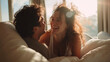 © Oksa Art - Joyful Morning: Young Couple Laughing and Cuddling in Sunlit Bedroom