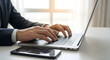 © Dutz Creative Studio - Hands Typing on Laptop Keyboard Close Up