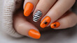 © Pisahouse - Halloween-themed acrylic nails featuring spiderwebs and pumpkins in a creative design.