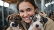 © Lens Legacy - Joyful girl embraces adorable puppies at animal shelter in winter