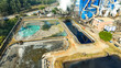 © rafaelnlins - Estação de tratamento de água e esgoto operando dentro de uma indústria de papel e celulose. A imagem destaca a infraestrutura e compromisso ambiental do setor industrial
