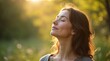 © Alex Pios - Serene woman with closed eyes breathing deeply in natural outdoor setting