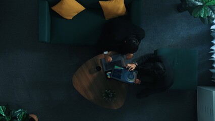 Wall Mural - top view of professional business people analyze stock market investment data by using laptop and fi