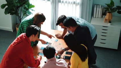 Wall Mural - top view of diverse business people discussing idea and designing system while using tablet with ux,