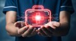 © Zabi - A person is holding a glowing first aid kit, representing modern healthcare solutions