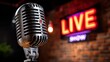© Lightning - A vintage microphone in the foreground with a neon 'LIVE SHOW' sign in the background, live entertainment, music performance, stand-up comedy, and public speaking event.
