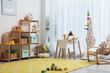 © New Africa - Stylish playroom with toys and furniture. Interior design