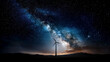 © ALA - Electricity in nature or clean energy concept. Wind turbine producing alternative energy on a hill at night with a starry sky background. Creative decoration with a small miniature. Selective focus